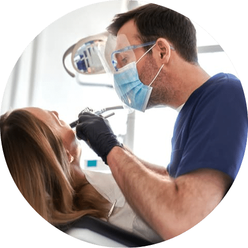 Dentist performing a thorough oral examination on a patient in a modern dental clinic, using professional instruments to assess oral health and identify any concerns before recommending treatment.
